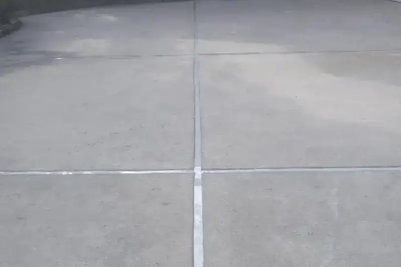 sealed concrete joints on driveway